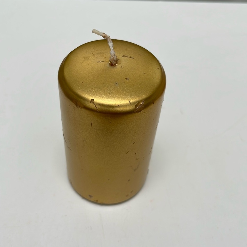 Gold display candle 2 x 4 inches. One wick.